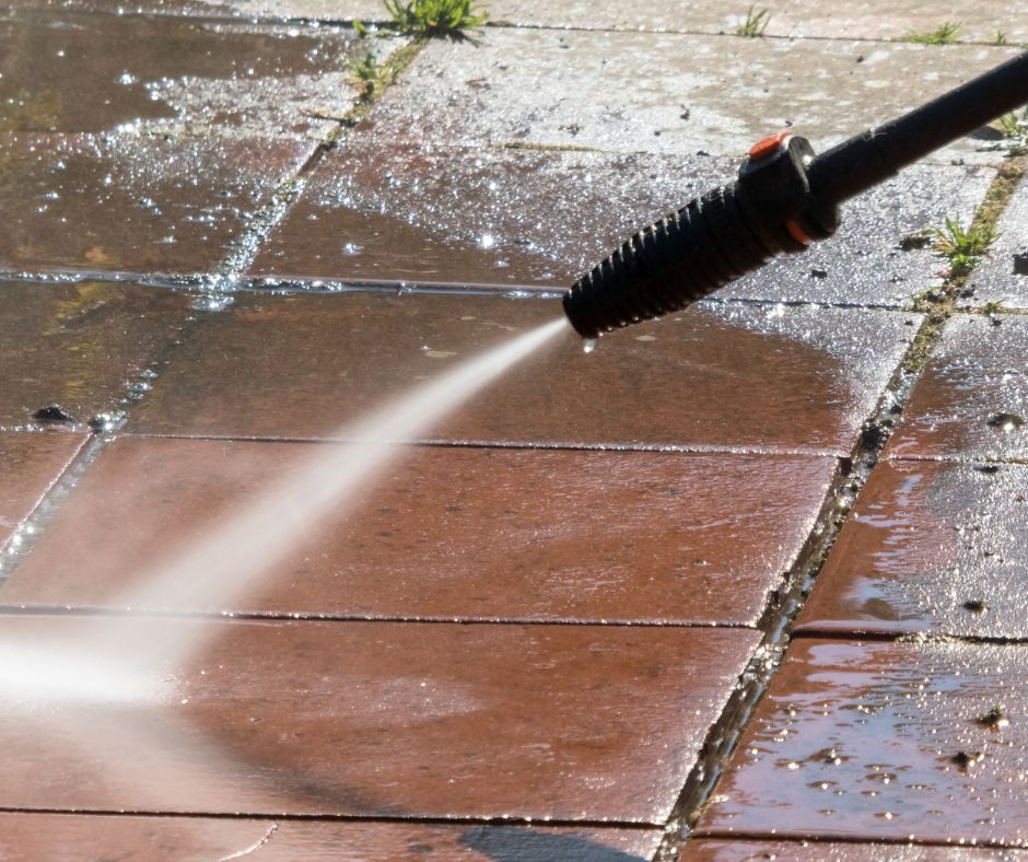 using high pressure washer for sanitation cleaning outdoor tile floor